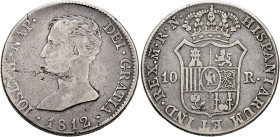 JOSÉ I BONAPARTE. 10 reales. 1812. Madrid. RN. Cuartel con dos mundos. AR 12,98 g. 32,04 mm. VI-24; AC-29. Amplia hoja en anv. BC+/MBC-. Escasa.