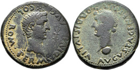 HISPANIA ANTIGUA. COLONIA ROMULA. Dupondio. Tiberio. A/ Cabeza radiada a der., encima estrella, delante haz de rayos; PERM DIVI AVG COL ROM. R/ Cabeza...
