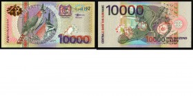 Paper money
Suriname - 10000 Gulden 2000 Brown, black and red on multicolor underprint. Ornate Hawk Eagle at left. Back: flower.P. 153. Almost UNC