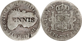 ENNIS on the obverse of a Spanish colonial 1797-LM IJ real. Brunk-Unlisted, Rulau-Unlisted. Host coin Very Good.
From the Sydney F. Martin Collection...
