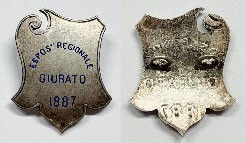 ITALIA. Distintivo del 1887 per l'Esposizione Nazionale - Giurato. Ag; 29x22 mm...