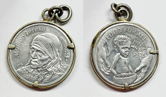 MADRE TERESA DI CALCUTTA. Medaglia in alluminio con montatura dorata. 27 mm

SPL