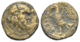 Greek. Umbria. Tuder. Circa 280-240 BC. Uncertain denomination (Bronze, 17.21 mm, 3.46 g). Bearded head of Silenos right, wearing wreath of ivy. Rev. ...