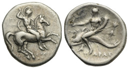 Greek. Calabria. Tarentum. Circa 280-272 BC. Nomos (Silver, 21.65 mm, 6.35 g). Struck under Sostratos and Poly- magistrates. Nude, helmeted warrior on...