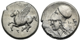Greek. Corinthia. Corinth. Circa 375-300 BC. Stater (Silver, 21.01 mm, 8.39 g). Pegasos flying left; Ϙ below. Rev. Helmeted head of Athena left; [Δ] -...