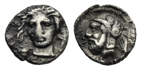 Greek. Cilicia. Tarsos. Time of Pharnabazos, circa 380-373 BC. Obol (Silver, 8.40 mm, 0.71 g). Female head facing slightly left, dolphins flanking. Re...