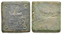 Antiquities. Medieval Bronze Commercial Weight. Circa 12th - 14th centuries (?). (20.96 x 19.59 mm). With latin cross flanked by F (?) - S, and enclos...