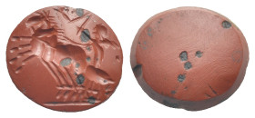 Glyptics. Roman Red Jasper Intaglio: Eros driving galloping biga left. Circa 1st century AD. (12.83 mm length). Signs of wear.