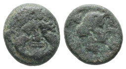 Macedon, Neapolis. AE. 1.42 g. - 11.09 mm. Circa 375-350 BC.
Obv.: Facing gorgoneion.
Rev.: Head of female right; ivy leaf? behind neck.
Ref.: AMNG II...