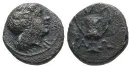 Thrace, Alopeconnesos. AE. 2.41 g. - 13.55 mm. Circa 400-300 BC.
Obv.: Head of Dionysos right, wearing ivy wreath.
Rev.: A / Λ / Ω. Kantharos; club to...