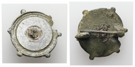 Roman, bronze disc-shaped fibula. ca.1st-3rd centuries AD. 4.71 g. - 22.91 mm.