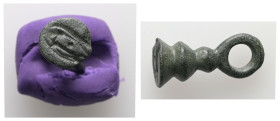 Roman, bronze stamp seal. AD. 1st-2nd centuries. 4.35 g. - 26.26 mm.
