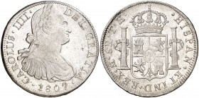 1807. Carlos IV. México. TH. 8 reales. (Cal. 707). 26,93 g. Leves marquitas. Parte de brillo original. MBC+.