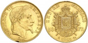 1866. Francia. Napoleón III. A (París). 50 francos. (Fr. 582) (Kr. 804.1). 16,08 g. AU. Golpes en canto. (EBC).