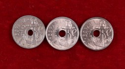 1949*1951 *1954 y *1956. Estado Españo. 50 céntimos. Tres monedas, una con el agujero central desplazado. S/C-.
