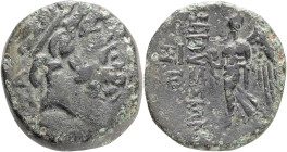 CILICIA. Elaioussa Sebaste.(1st century BC).Ae. Obv : Head of Zeus right, wearing taenia; AP behind. Rev : EΛAIOYΣIΩN. Nike avdancing left, holding wr...