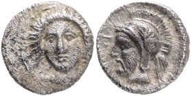 CILICIA. Tarsos. Pharnabazos, Persian military commander (380-374/3 BC). AR hemiobol. Obv: Female head facing slightly left; dolphins flanking. Rev: B...