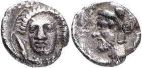 CILICIA. Tarsos. Time of the satraps Pharnabazos and Datames. (Circa 380-360 BC). AR obol. Obv: Helmeted and bearded male head (Ares?) to left. Rev: F...