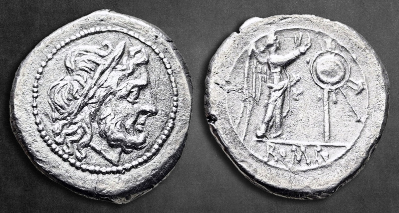 Anonymous after 218 BC. Rome
Victoriatus AR

18 mm, 2,99 g

Laureate head o...