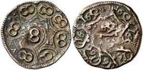 1652. Felipe IV. Granada. (Cal. pág. 370) (J.S. pág. 322). 6,10 g. Resellos múltiples con el valor 8 y que ocupan toda la moneda. Rara. MBC.