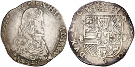 1694. Carlos II. Milán. 1/2 felipe. (Vti. 17) (MIR. 388/2). 13,51 g. Bajo busto maduro: (marca de ensayador). Escasa. MBC-.