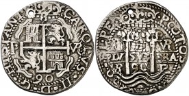 1690. Carlos II. Potosí. . 8 reales. (Cal. 328) (Lázaro 227 var). 26,16 g. Redonda. Tipo de presentación real. Leyendas de ambas caras separadas por ....