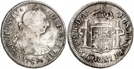 1789. Carlos IV. Santiago. DA. 2 reales. (Cal. 1035). 6,46 g. Busto de Carlos III. Ordinal IV. Leves manchitas. Escasa. MBC-/MBC.