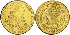 1807. Carlos IV. Lima. JP. 8 escudos. (Cal. 28) (Cal.Onza 1006). 27,04 g. Levísimas hojitas en reverso. Bella. Parte de brillo original. (EBC-).