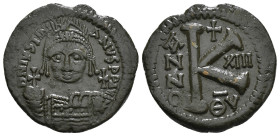 Justinian I, AD 527-565. AE, Half Follis. Theoupolis (Antioch).
Obv: D N IVSTINI-ANVS P P AVG. Helmeted and cuirassed bust of Justinian I facing, hold...