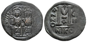 JUSTIN II (565-578). Follis. Nicomedia. Dated RY 9 (573/4).
Obv: D N IVSTINVS P P AVC.
Justin, holding globus cruciger, and Sophia, holding cruciform ...