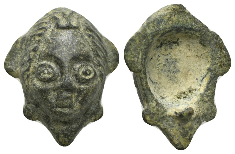 Roman bronze face aplique
12,00 g - 27,33 mm