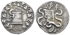 Phrygia, Apameia AR Cistophoric Tetradrachm. (25mm, 12,58 g) Circa 150-140 BC. Cista mystica with serpent; all within ivy wreath / monogram to left an...