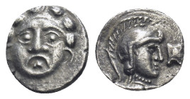Pisidia. Selge circa 350-300 BC. Obol AR (9mm, 0,84 g) Facing gorgoneion / Head of Athena to right, wearing crested Attic helmet; before, astragalos.
