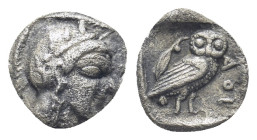 ATTICA. Athens. Obol (9mm, 0,58 g) (Circa 454-404 BC). Obv: Head of Athena right, wearing Corinthian helmet decorated with olive wreath. Rev: AΘE. Owl...