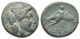 CARIA, Iasos. Circa 250-190 BC. Æ (18mm, 6.37 g). Laureate head of Apollo right / Hermias swimming with dolphin right.