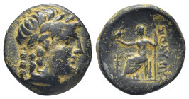 PAMPHYLIA. Sillyon. 3rd century BC. AE (16mm, 5,11 g). Laureate head of Apollo to right. Rev. ΣΕΛΥИΙΥΣ Zeus seated left on low throne, holding long sc...