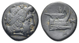 KINGS of MACEDON.Demetrios I.306-283 BC. Uncertain mint in Caria.AE (14mm, 2.77 g).Laureate and bearded head of Zeus to right / Β Α, prow of galley to...