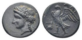 CARIA, Halikarnassos. Mid 4th-3rd centuries BC. Æ (12mm, 1.17 g). Laureate head of Apollo left / Eagle standing left, wings displayed; lyre before.