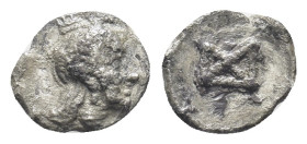 ASIA MINOR, Uncertain. 4th century BC. AR Hemiobol (8mm, 0.30 g). Turreted head of female right / Monogram;