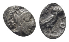 Attica, Athens. AR Hemiobol, (7mm, 0,28 g). Circa 454-404 BC. Obv: Helmeted head of Athena right. Rev: AΘΕ, Owl standing right, head facing; olive spr...