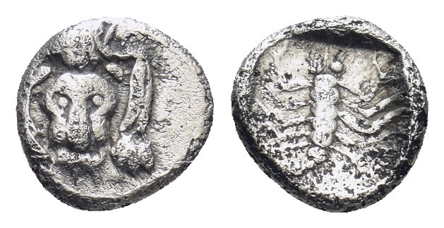 CARIA. Mylasa, circa 450-400 BC. AR Obol (7mm, 0,52 g) Obv. Facing lion’s scalp....