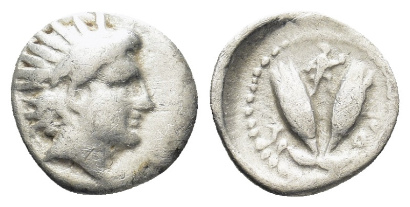 CARIA. Rhodes.(Circa 275-250 BC).Diobol. (0.91 Gr. 10mm.)
Radiate head of Helios...