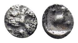 Caria, Mylasa. 525-494 B.C. AR tetartemorion (5mm, 0.18 g). Lion's head left / Bird (Quail?) standing right, two pellets, within incuse square.