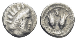 Caria, Rhodes. AR, Diobol. (9mm, 0,79 g). Circa 275-250 BC. Obv: Radiate head of Helios right. Rev: P - O. Two rose buds. Lyre.
