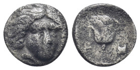 Caria, Rhodos. AR Hemidrachm, (11mm, 1,61 g). Circa 408/7-394 BC. Obv: Head of Helios facing slightly right. Rev: P – [O]. Rose.