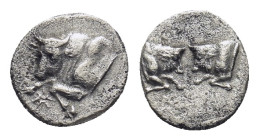 Caria, Uncertain. AR Hemiobol. (57mm, 0,34 g). 5th century BC. Obv: Confronted foreparts of two bulls. Rev: Forepart of bull left.