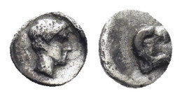 Caria. Halikarnassos circa 500-400 BC. Tetartemorion AR (4mm., 0,13 g). Ram's head right / Young male head right.