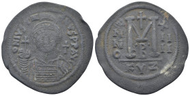 Justinian I AD 527-565. Dated RY 14=540/1 AD. Cyzicus Follis or 40 Nummi (19.90 Gr. 41mm.)
Helmeted and cuirassed bust facing, holding globus cruciger...