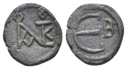 Justin II AD 565-578. Constantinople Pentanummium Æ (13mm., 1,76 g). Monogram of Justin and Sophia / Large E, B to right.