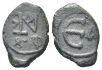 Justin II AE 5 Nummi. Antioch, AD 569-578. (12mm. 1,9 g) Monogram Rev. Large E, A(?) to right.
